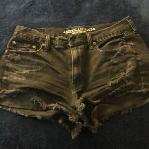 Black distressed AE jean shorts